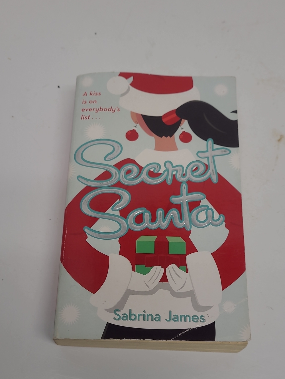 Secret Santa Holiday Novel by — Festive Red, White & Green Cover